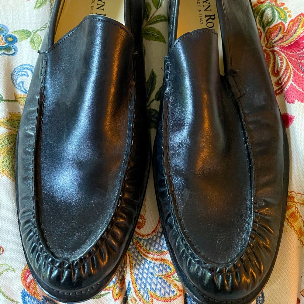 Black leather loafers